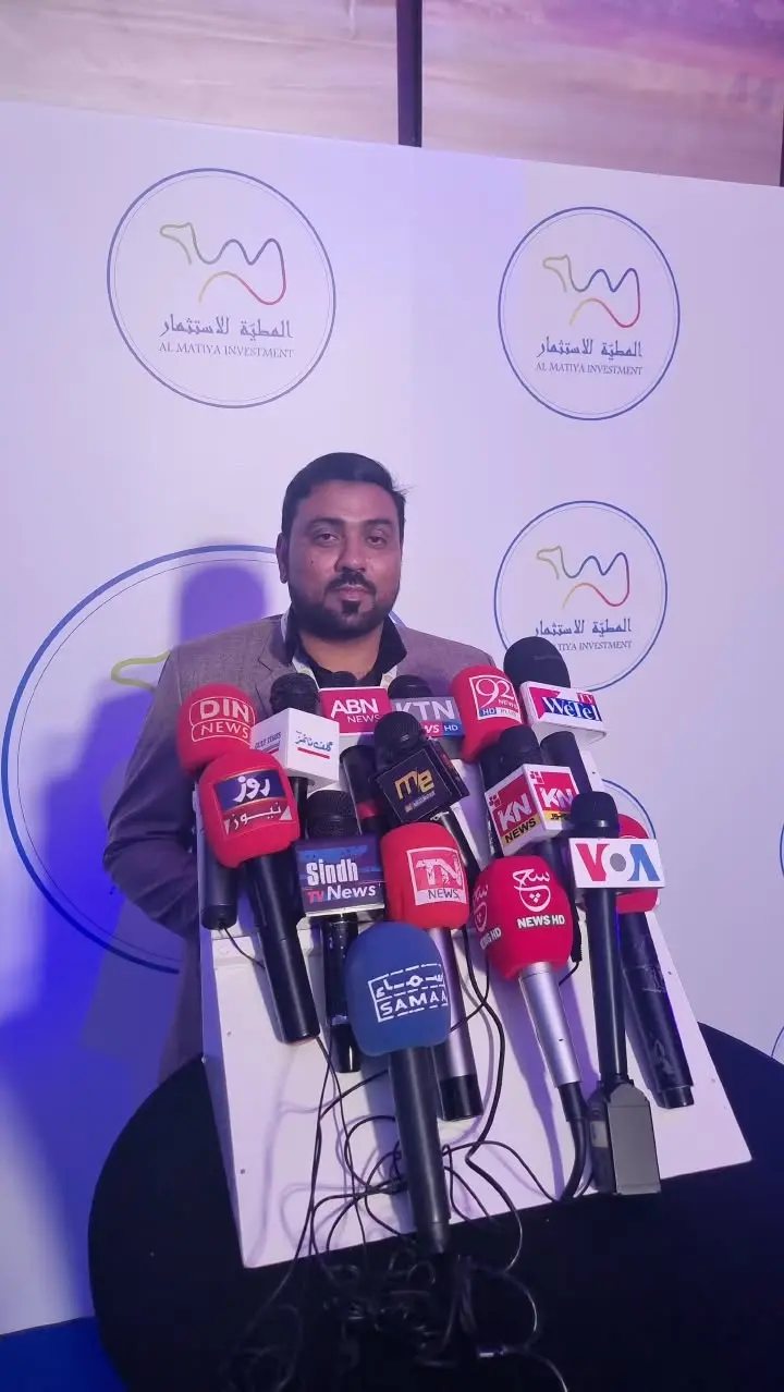 Press conference coverage with television and news microphones