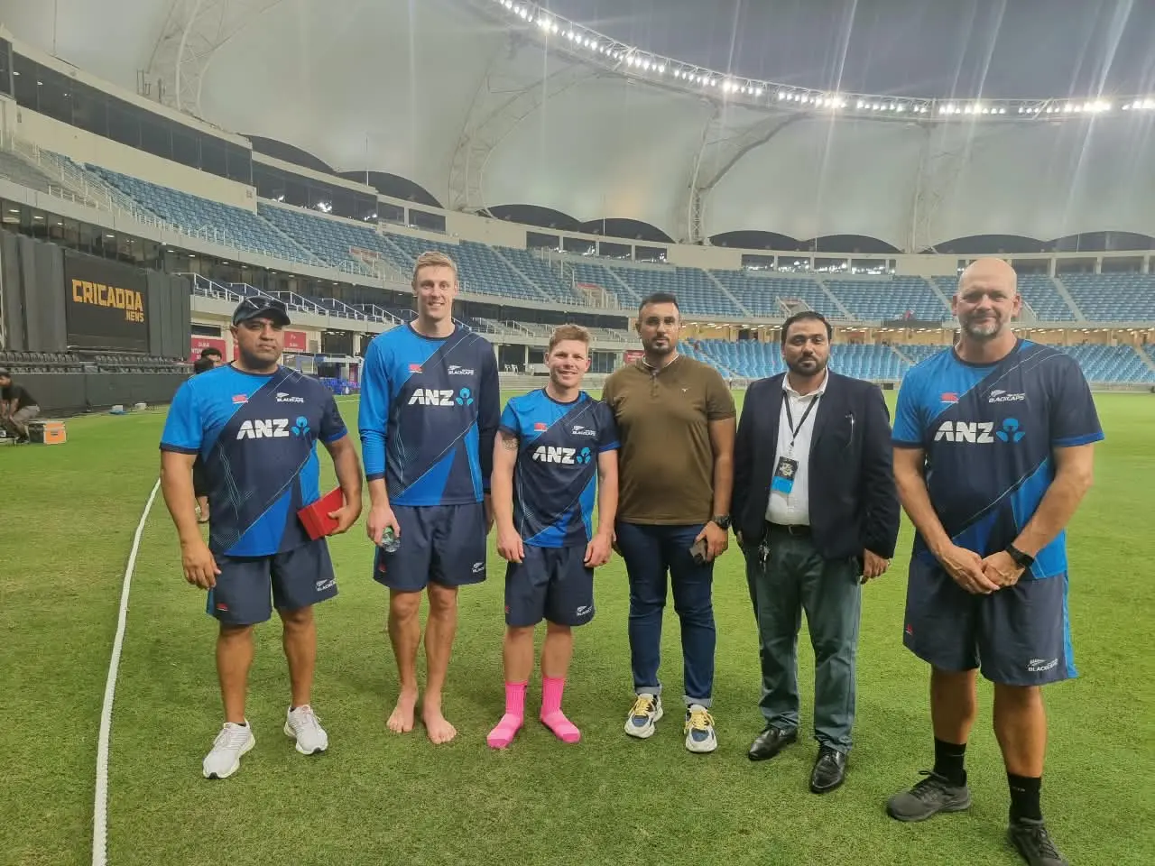 Gulf Media representatives with an international cricket production team at a stadium